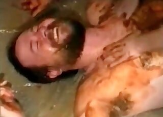 Submissive lad in the bathroom is eating shits of a woman