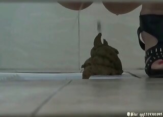 The camera is on the floor as the pervert is filming