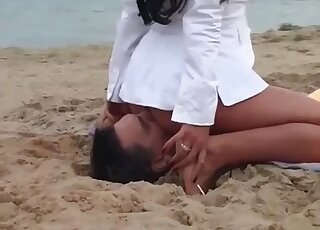 Submissive girl is sitting on the face of a horny lad